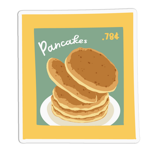 A retro-style illustrated sticker or card featuring a stack of pancakes on a plate, with the word 'Pancakes' and the price '.784' on a yellow border against a white background.