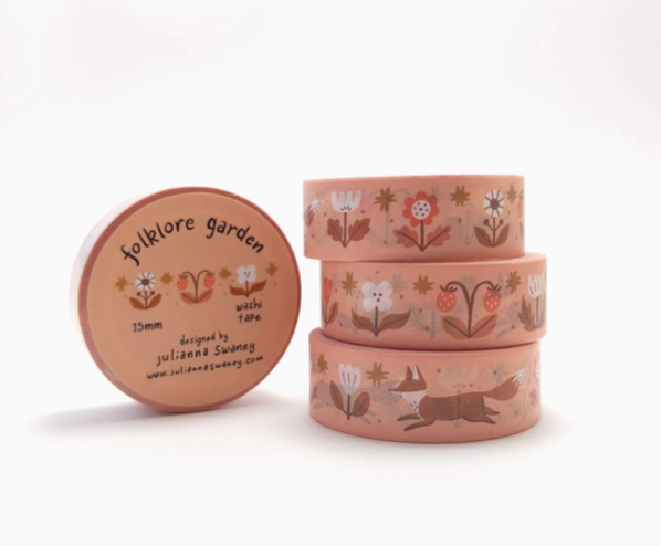 Set of three pink washi tape rolls with nature-themed designs on a white background