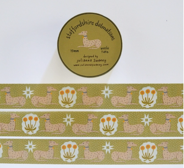 Roll of ribbon with dog pattern and 'Staffordshire delimiters' branding on a white background