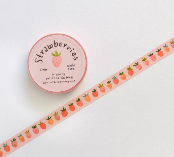 Washi tape with strawberry design and packaging on a white background