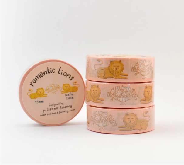 Set of pink washi tape rolls with lion designs on a white background