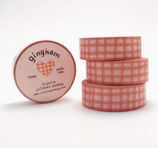 Pink gingham washi tape with a container on a white background
