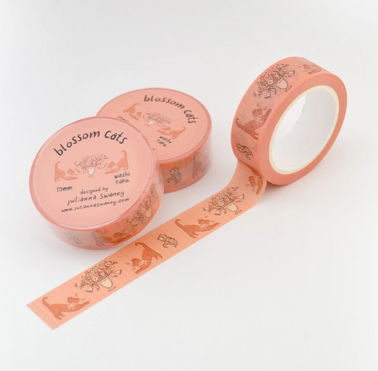 Three rolls of pink washi tape with 'blossom cats' design on a white background