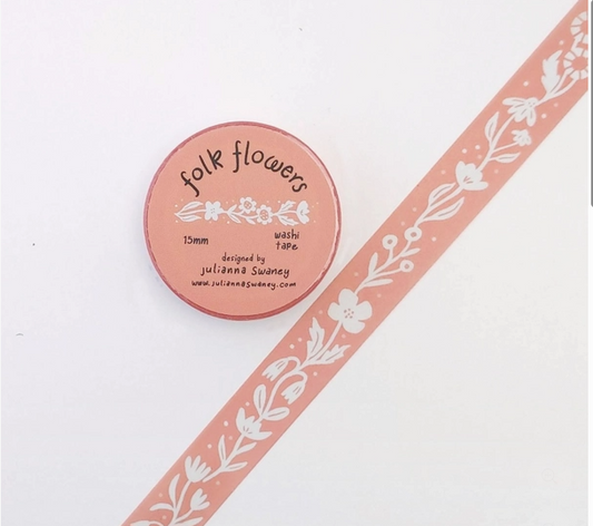 Washi tape with 'folk flowers' design and packaging on a white background