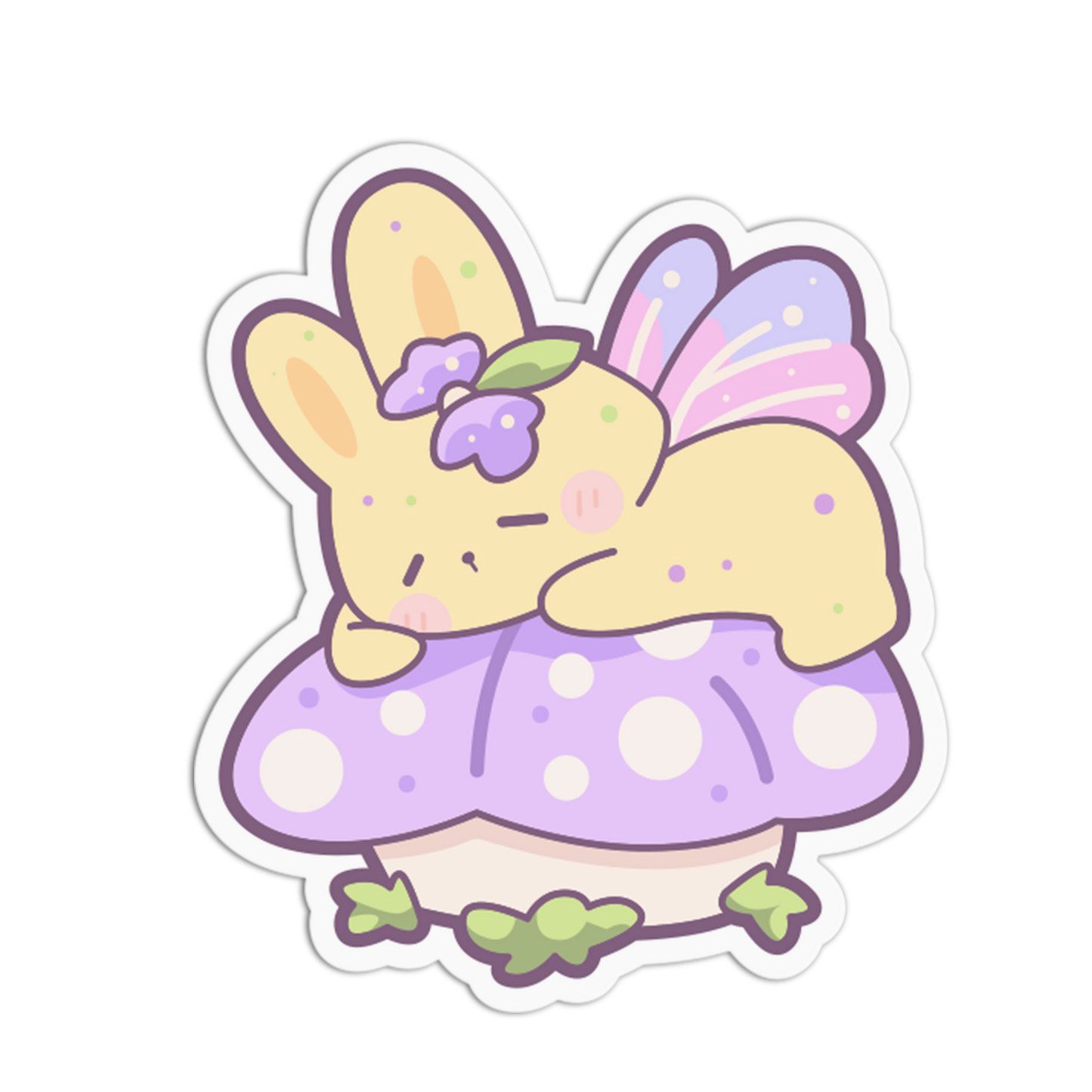 A cute cartoon bunny fairy sticker or decal showing a yellow bunny with purple wings and flowers, sitting on a purple polka-dot mushroom, on a white background.