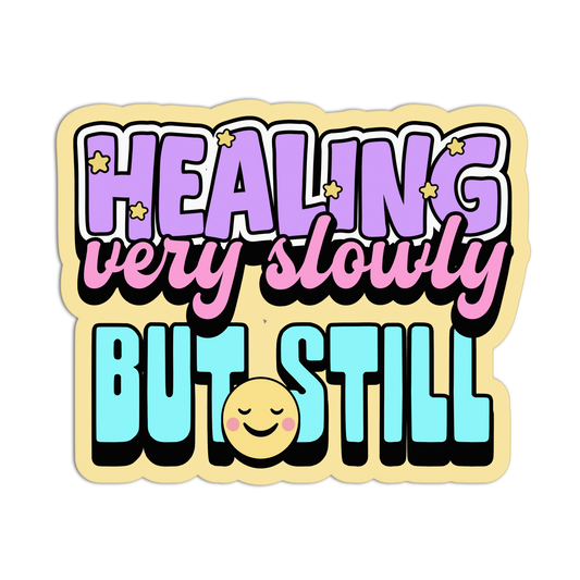 Sticker with text 'HEALING very slowly BUT STILL' and a smiley face on a beige background