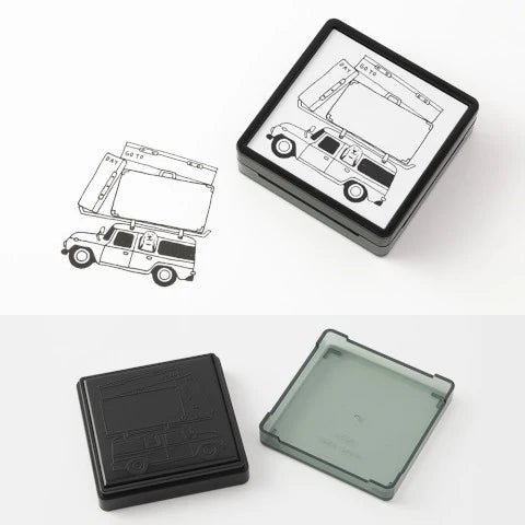 Car-shaped stamp and ink pad on a white background