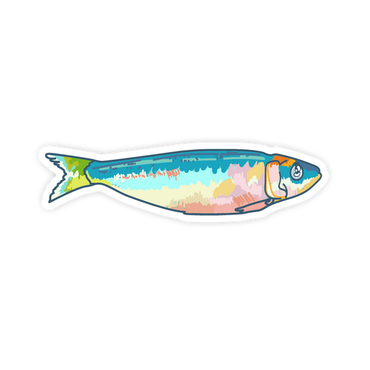 Colorful fish-shaped sticker with a scenic design on a white background