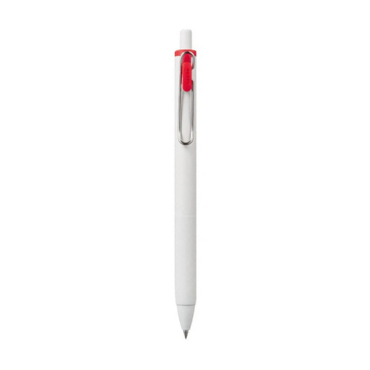 White pen with a red clip on a white background