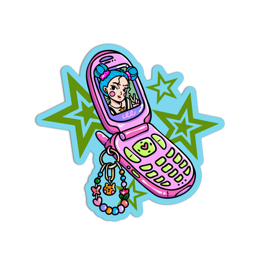 A die-cut sticker featuring a retro pink flip phone with a colorful beaded charm, set against green stars on a light blue background.