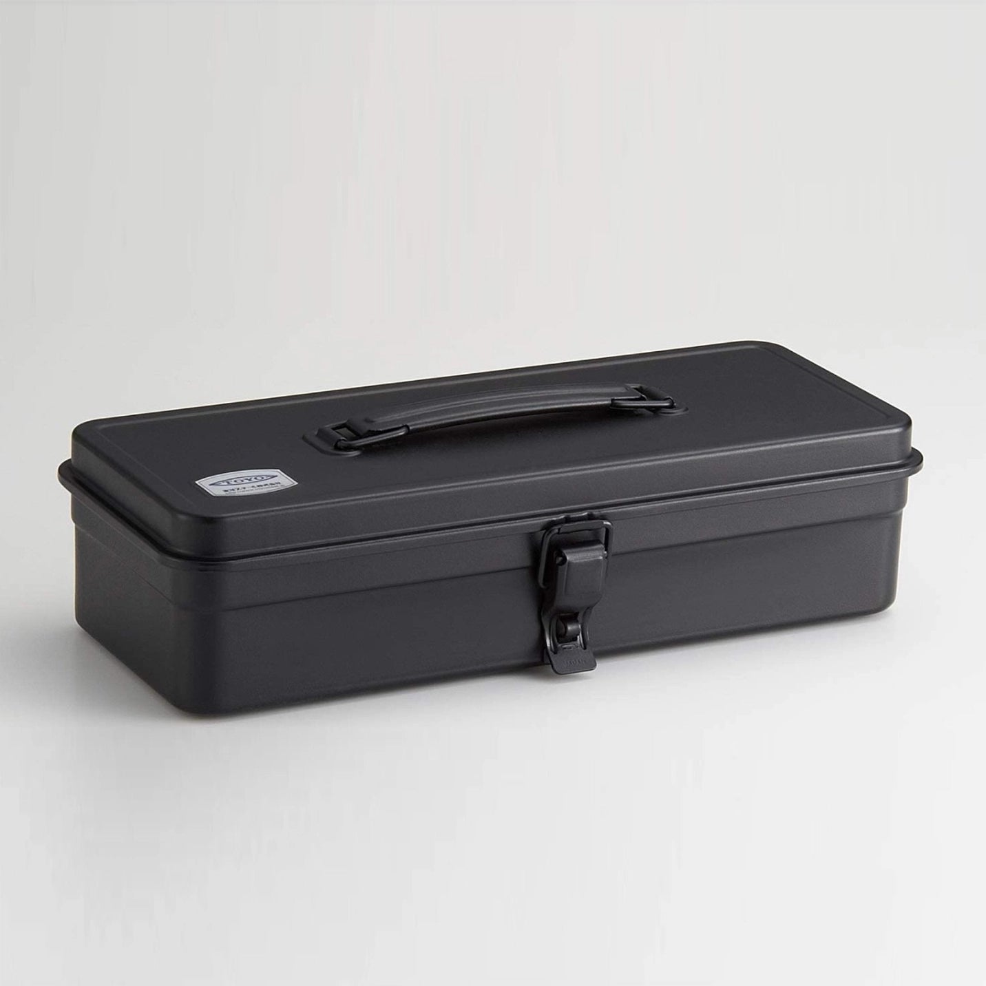 Black toolbox with a handle on a light gray background