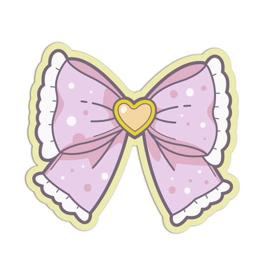 Pastel pink bow with a heart center on a white background