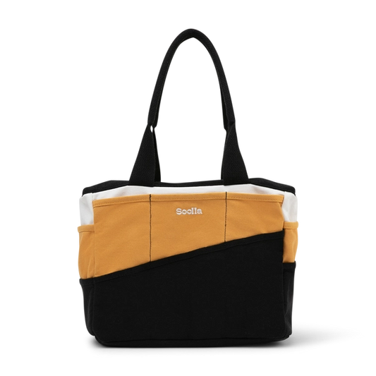 Tote bag with black and mustard yellow design on a white background