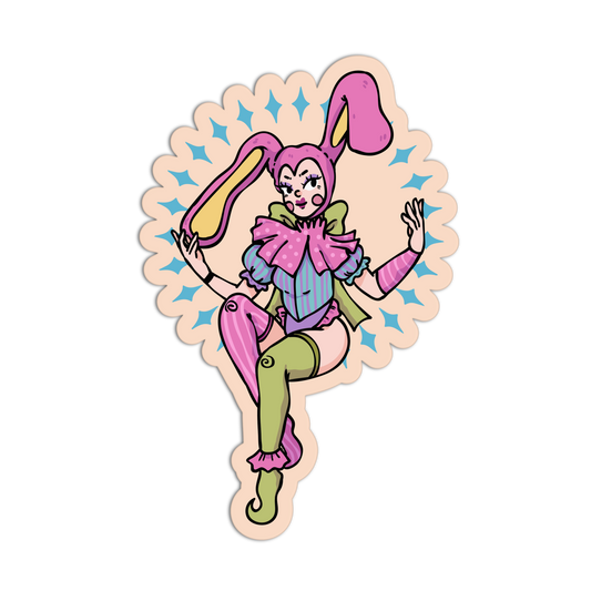 A die-cut sticker featuring a stylized cartoon bunny girl in a pink and blue jester outfit with green pants, set against a peach background with blue star accents.