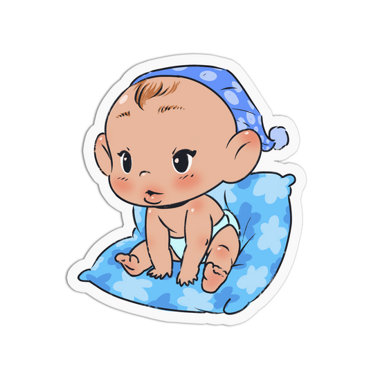 A die-cut sticker featuring a cute cartoon baby sitting on a blue patterned pillow and wearing a blue polka-dot sleep cap, shown on a plain white background.