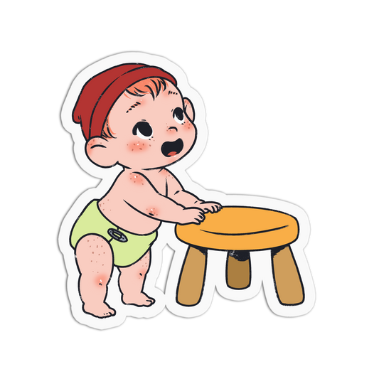 A cartoon sticker of a baby with red cheeks and spots, wearing a red beanie and a light green diaper, standing next to a small orange stool on a white background.