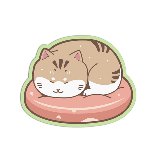 Sticker of a cat on a pink cushion with a white background