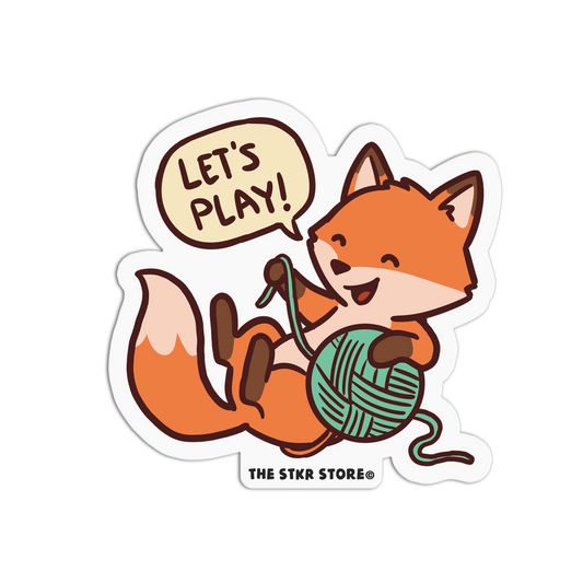 Sticker of a fox holding yarn with 'Let's Play!' text, from The STKR Store.
