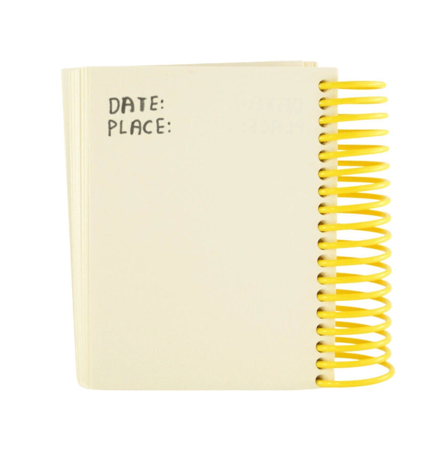 Notebook with yellow spiral binding and prompts for 'Date' and 'Place'