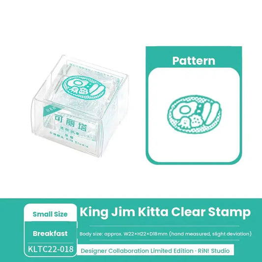 King Jim Kitta Clear Stamp in a small clear plastic case, shown next to a teal pattern preview on a white background with a teal product banner at the bottom.