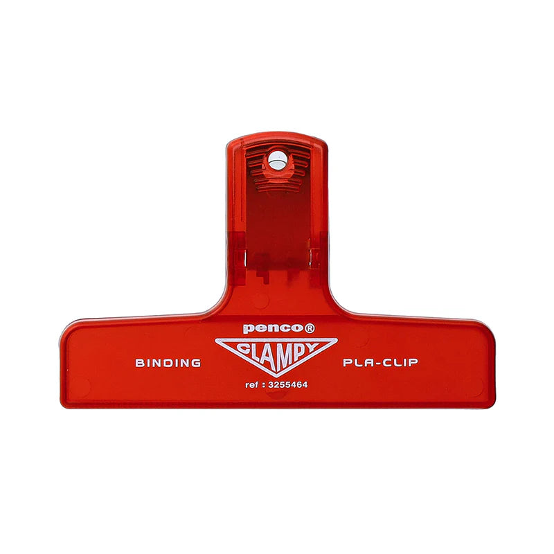 Red binding clip with 'Penco' branding on a white background