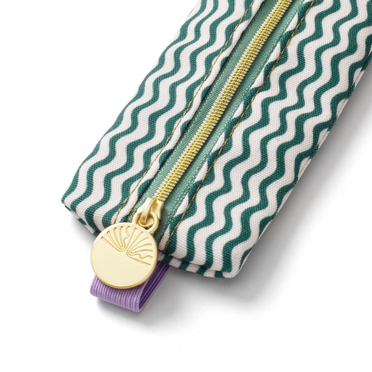 Pouch with green and white wavy pattern, gold zipper, and purple ribbon on a white background