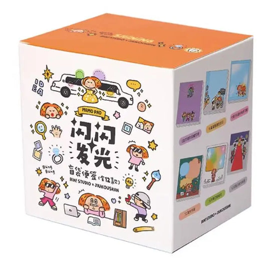 A square product box with a white front and side panels, topped with an orange lid. The box is decorated with colorful cartoon illustrations and Chinese text, including a bus and small character drawings.