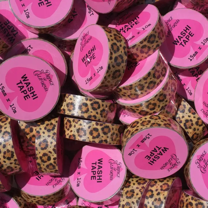 Leopard print washi tape with pink labels in a pile
