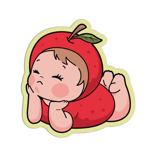 A cartoon die-cut sticker of a baby wearing a red apple costume, lying down and resting on their hands, on a solid white background.