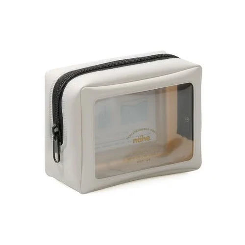 White cosmetic bag with clear window and black zipper on a white background