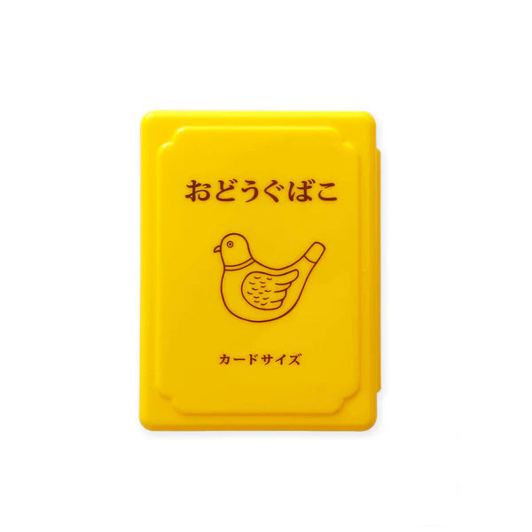 Yellow card-sized product packaging with a bird illustration and Japanese text on a white background