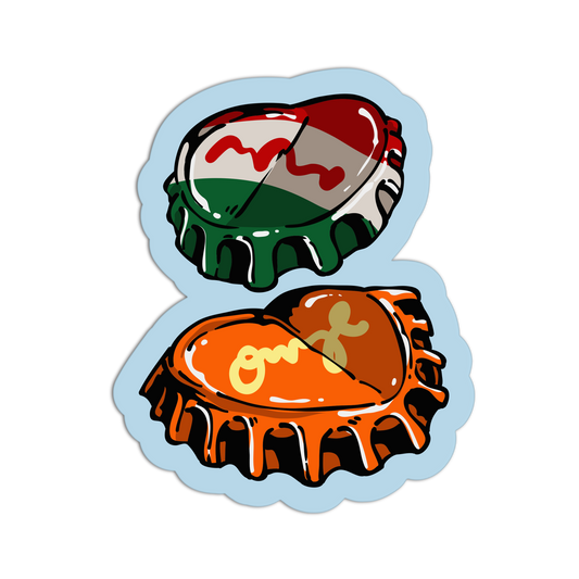 A die-cut sticker featuring two heart-shaped bottle caps. The top heart is decorated with the Iraqi flag colors (red, green, white) with a black star, and the bottom heart is orange with yellow calligraphy and a small cross.