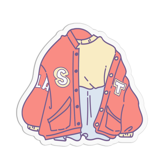 A die-cut sticker featuring a stylized illustration of a coral pink varsity jacket layered over a pale yellow shirt and light blue pants, with white letter patches reading 'LA' and 'T'.