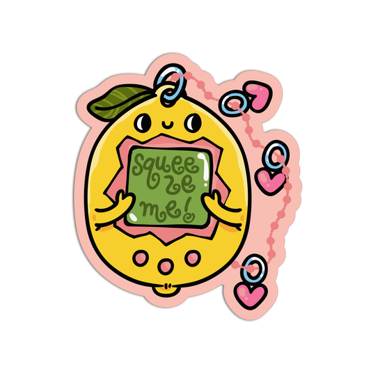 A die-cut sticker featuring a cute cartoon tamagotchi-style character with a yellow body, pink trim, a green leaf on its head, and a green screen that reads 'squeeze me!'. Pink hearts and a wavy pink line decorate the design, all on a plain white background.