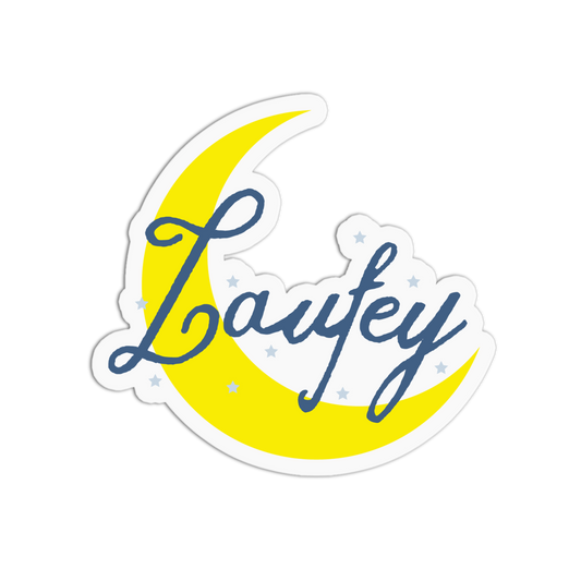 A die-cut sticker featuring a yellow crescent moon with the word 'Laufey' written across it in blue cursive script, surrounded by small white stars, shown on a plain white background.