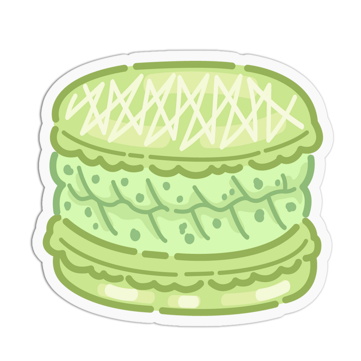 A die-cut sticker featuring a cute, cartoon-style illustration of a light green macaron with white cream details, shown on a solid white background.