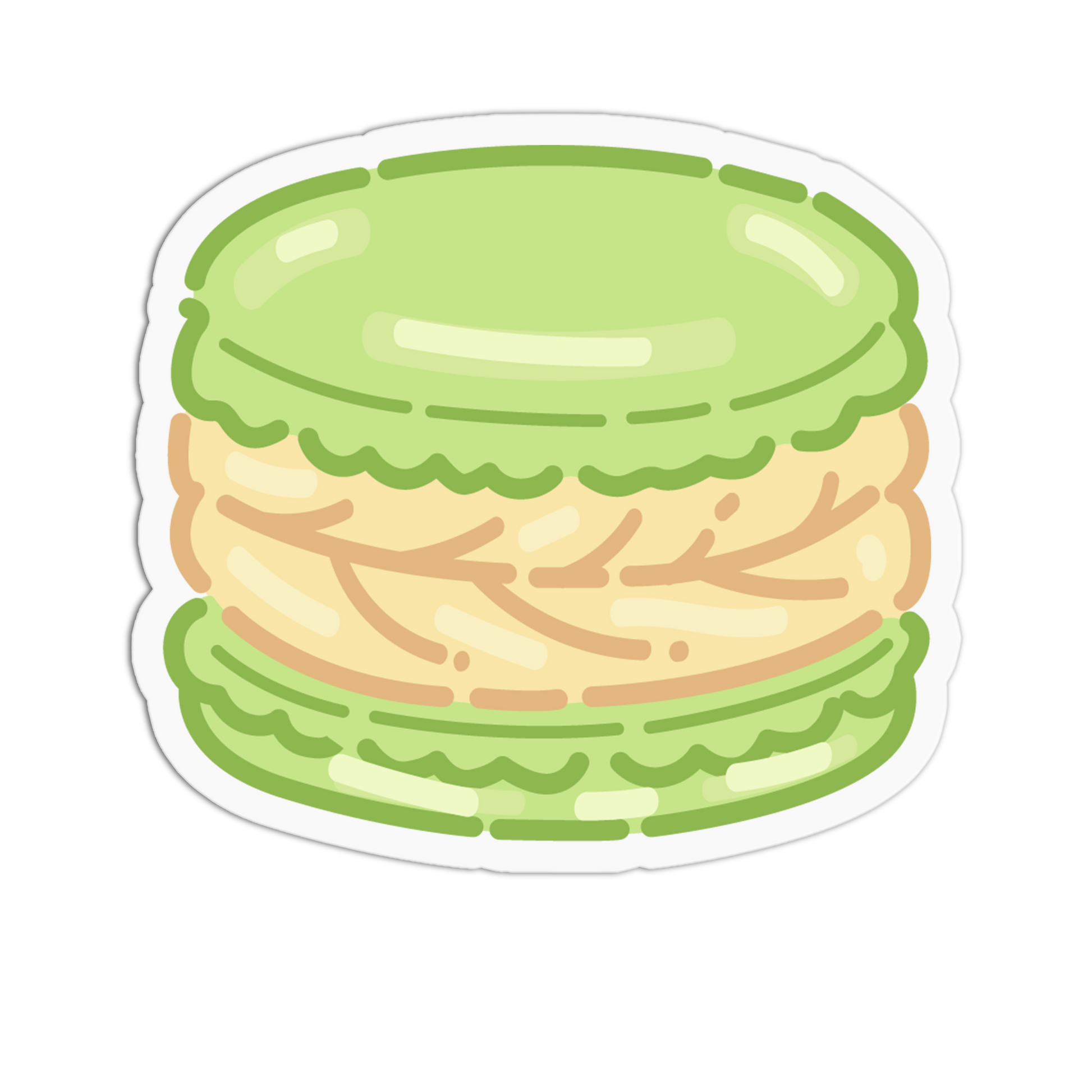 A die-cut sticker featuring a cute, cartoon-style green macaron with a light beige filling, shown on a solid white background.