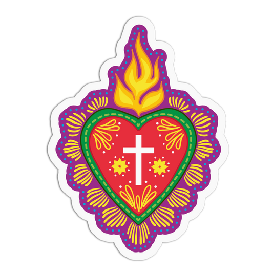 A colorful die-cut sticker featuring a stylized Sacred Heart design with a red heart, green border, white cross, yellow flame, and purple outer scalloped outline on a white background.