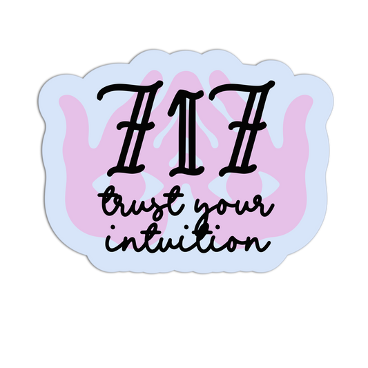 Decorative sticker with '717 trust your intuition' text on a pink and white background