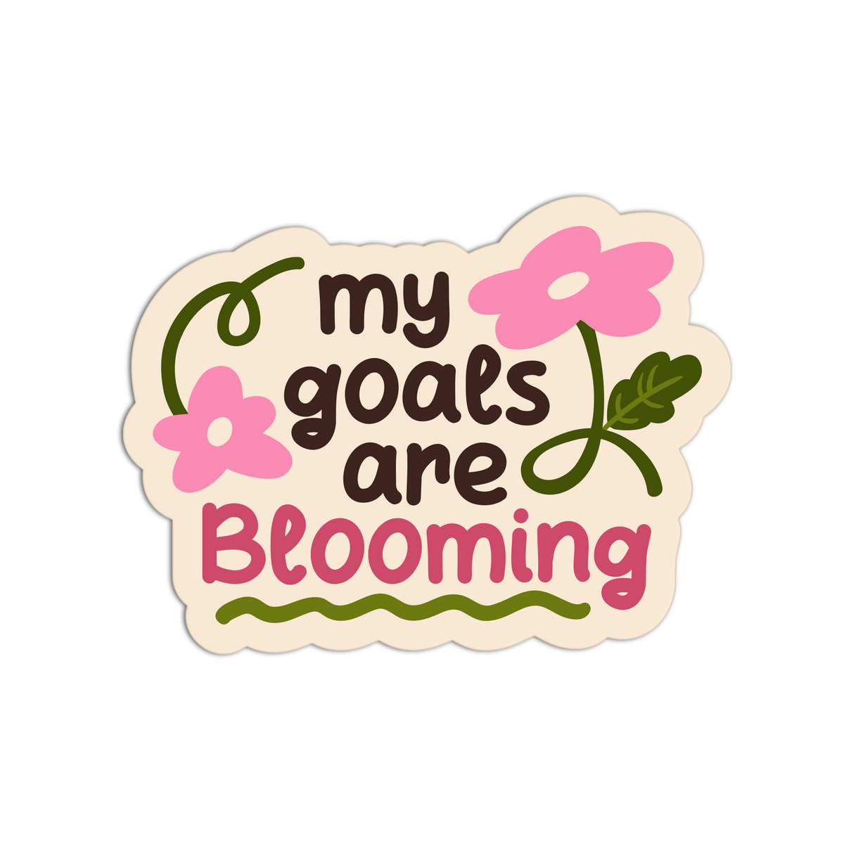 A die-cut sticker with the phrase 'my goals are Blooming' in dark brown and pink lettering, decorated with pink flowers and green leaves on a cream background, shown on a plain white backdrop.