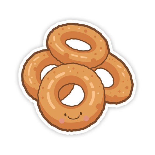 Cartoon donuts with a smiling face on a white background