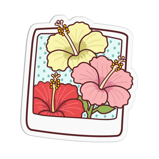 A die-cut sticker featuring a retro polaroid-style frame with three hibiscus flowers in yellow, pink, and red on a light blue dotted background.